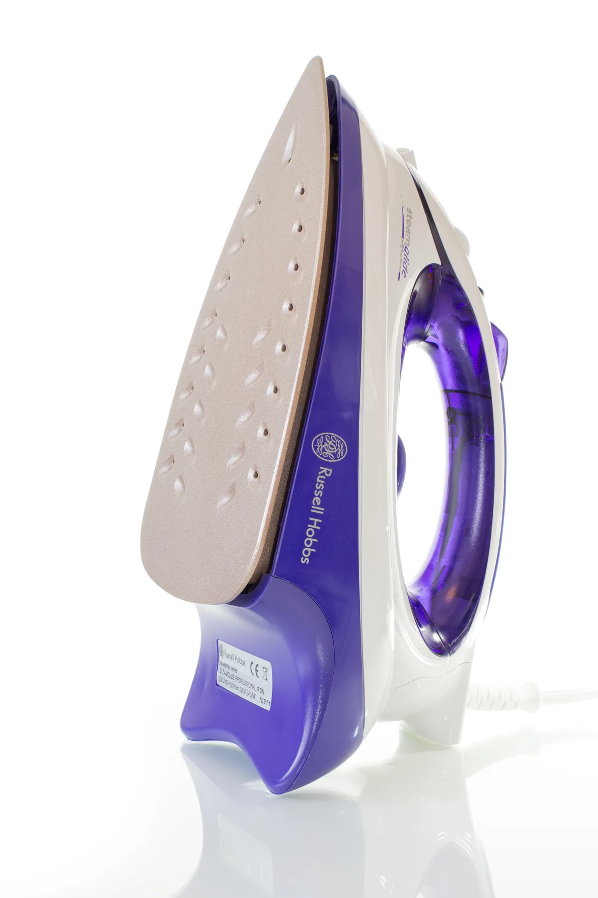 A purple-and-white Russell Hobbs steam iron stands upright against a bright white background, with its beige soleplate facing forward and the handle and water reservoir visible in profile. The clean studio lighting creates a soft reflection beneath the iron.